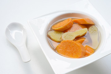 Asian dessert soup. Sweet potato soup boiled with ginger

