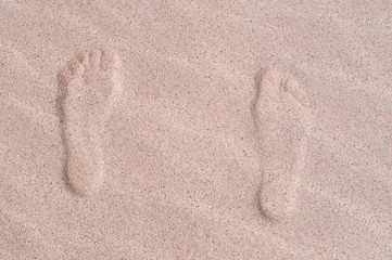 Fototapeta na wymiar Fuerteventura, Isole Canarie: impronte di piedi sulle dune di sabbia i 3 settembre 2016