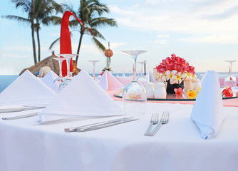 Decorated wedding table at reception beach resort