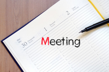 Meeting text concept on notebook