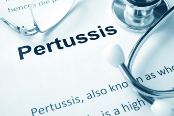 Paper with word  Pertussis disease and stethoscope.