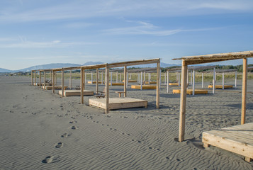 Wooden beds on the beach