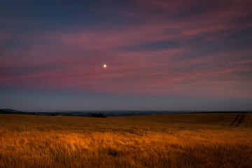 Fototapeta na wymiar Moon and Sunset