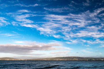 Deep blue sky with clouds