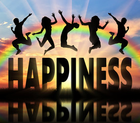 Silhouette people jumping over the word happiness