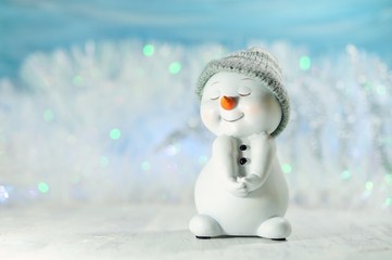 White Christmas - Christmas decoration on a blue background - snowman