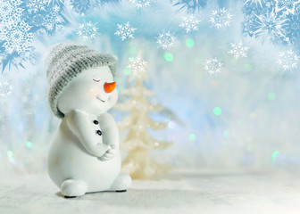 White Christmas - Christmas decoration on a blue background - snowman
