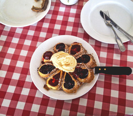 Belgian waffle with jam and ice cream