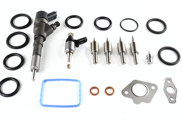 Spare parts for diesel engines on a white background