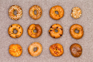 12 different speciality bagels displayed on cotton