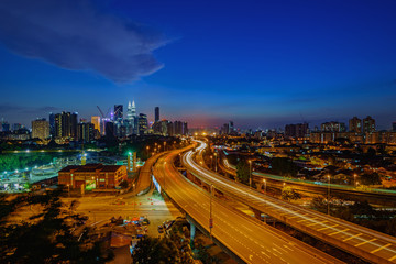 Fototapeta na wymiar Dramatic scenery of elevated highway heading towards Kuala Lumpu