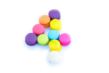 Fototapeta na wymiar Colorful macarons,number 4 on white background