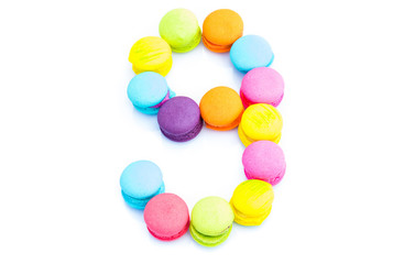 Fototapeta na wymiar Colorful macarons,number 9 on white background