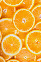 citrus background. juicy slices of orange cover the entire surface