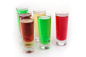 Transparent glass cup with a carbonated beverage