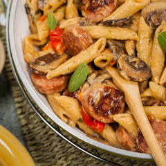 Sausage Pasta Alfredo Dinner. Selective focus.