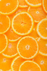 citrus background. juicy slices of  orange cover the entire surface.