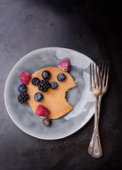 Pancackes on black backgound