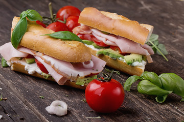 Sandwiches on rustic wooden Board