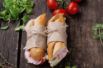 Sandwiches on rustic wooden Board