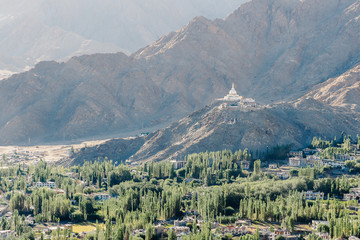 Nature and mountain landscape with stupa monastery on top of hill - in Leh Ladakh, India