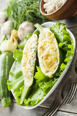 Zucchini stuffed with curd cheese
