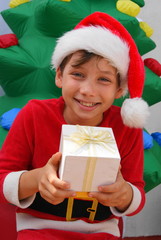 happy boy with christmas gift