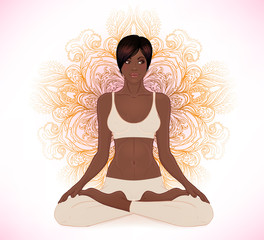 Beautiful African American Girl sitting in Lotus pose with ornat
