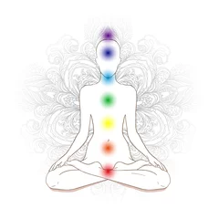 Muurstickers Chakras concept. Silhouette in lotus position over gray ornate m © vgorbash