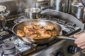 chef restaurant keeps food for hotel guests