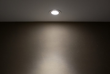 Interior wall and spotlight as background