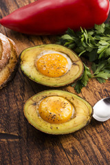 Homemade Organic Egg Baked in Avocado with Salt and Pepper