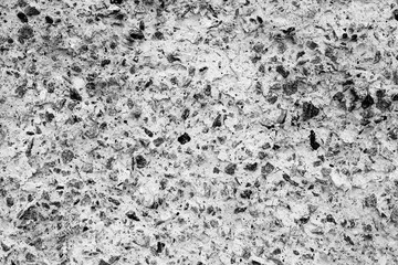 Wall fragment with scratches and cracks