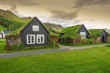 Traditional Icelandic houses with grass roof,  Iceland - obrazy, fototapety, plakaty