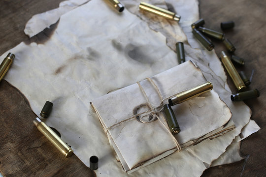 bullet and retro paper on the table