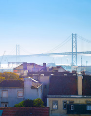 Naklejka premium Lisbon buildings and bridge, Portugal