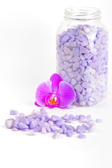 Salt in the bottle and orchid flower