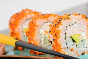 California maki sushi with orange masago