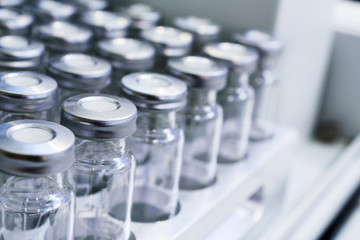 Glass vials for liquid samples. - obrazy, fototapety, plakaty