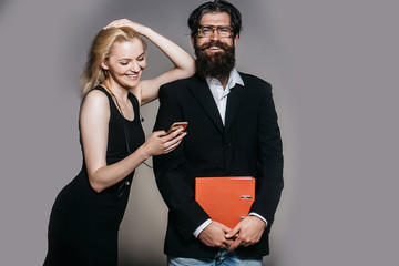 Smiling woman and bearded man