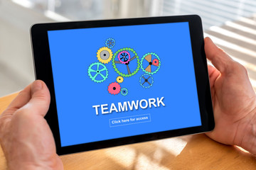 Fototapeta na wymiar Teamwork concept on a tablet