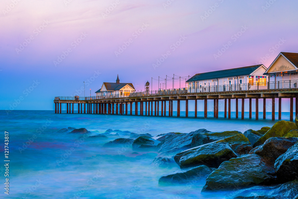 Wall mural southwold pier, a popular english seaside destination in suffolk, at sunset