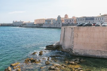 Coast of Ortigia island at city of Syracuse, Sicily, Italy