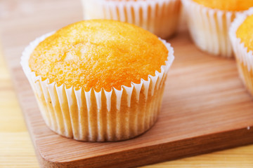 mini muffins on wooden table