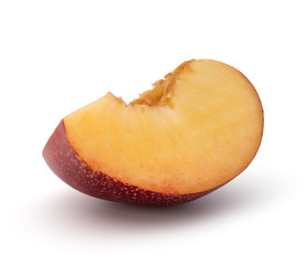 Nectarine fruit slice isolated on white background close up