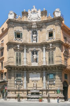 Corner house "Quattro Canti di Cittan" at crossroads in Palermo
