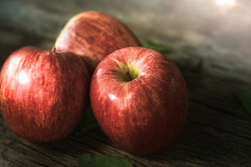 group of red apple on wood table, red apple background for good