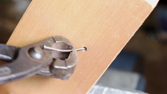 Remove nail from wooden Plank,  no sound, low focus