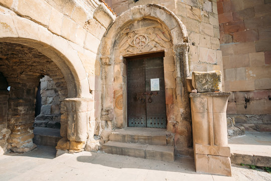 Mtskheta, Georgia. Entrance To Ancient Jvari Monastery, Georgian