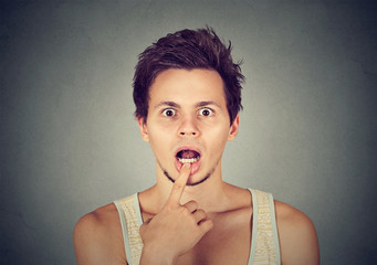 closeup portrait surprised young man